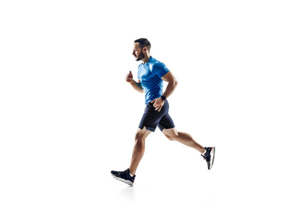 istock Caucasian professional male runner, athlete training isolated on white studio background. Copyspace for ad. 1303160981