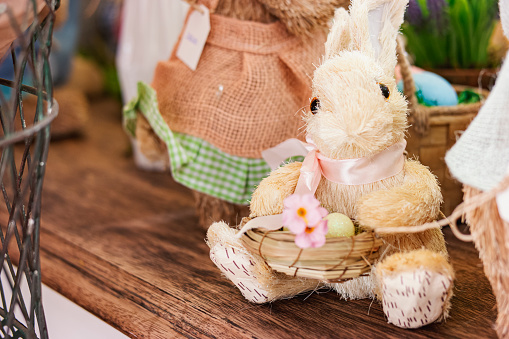 Photo of a dinner able with easter decoration.\nAll easter rabbits and eggs are handmade.