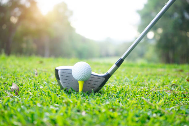 istock Golf ball and golf club in beautiful golf course 1303162183