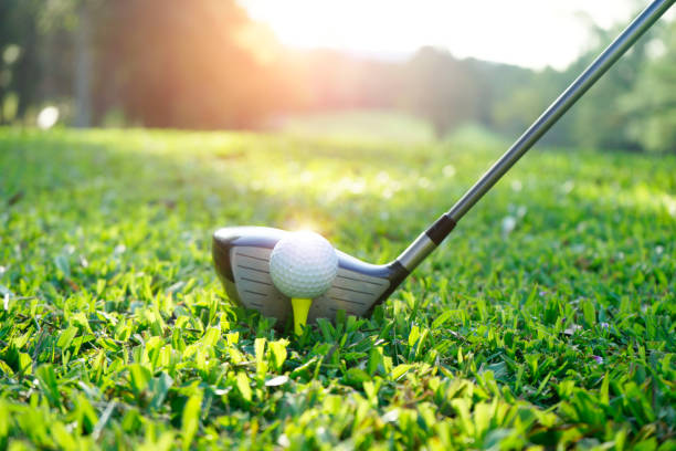 istock Golf ball and golf club in beautiful golf course 1303162203