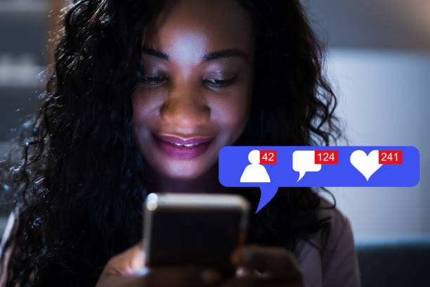 istock African Woman Using Mobile Phone Or Smartphone At Night 1303167004
