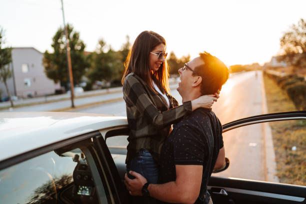 istock Young couple sharing love on road trip 1303167784