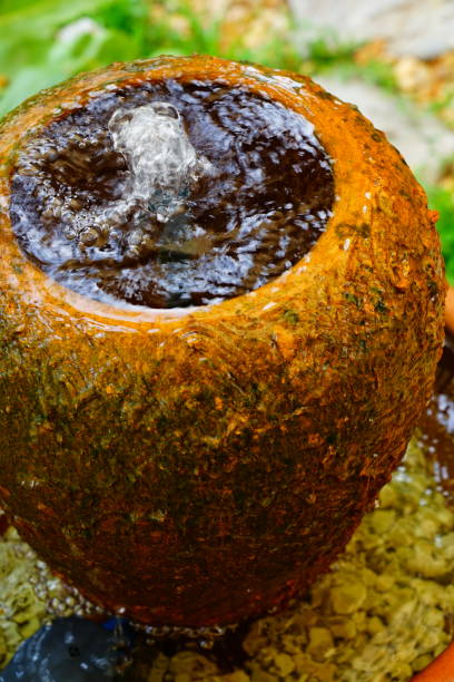 istock Small fountaun on a jar 1303168028