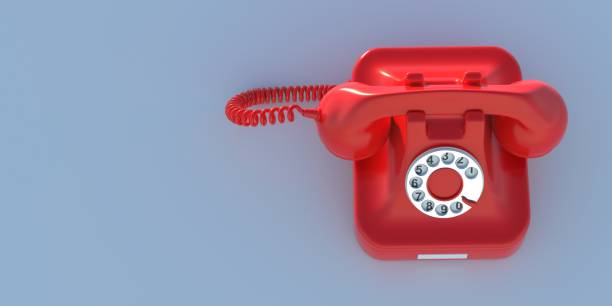 istock Retro telephone, red old phone on blue background, copy space. 3d illustration 1303169354