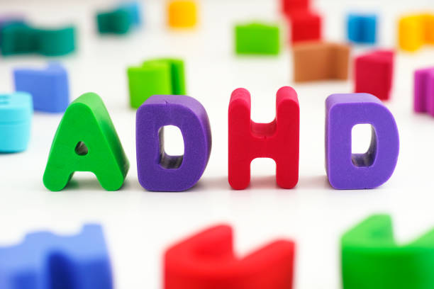 the abbreviation adhd made out of polymer clay letters. - behavioral problems imagens e fotografias de stock