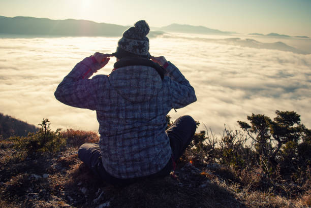 istock Beautiful sunset in the mountains. Higher than clouds. 1303169579