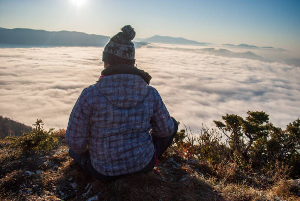 istock Beautiful sunset in the mountains. Higher than clouds. 1303169605