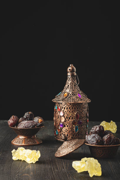 istock Ramadan concept with lantern and plate of dried dates 1303170486