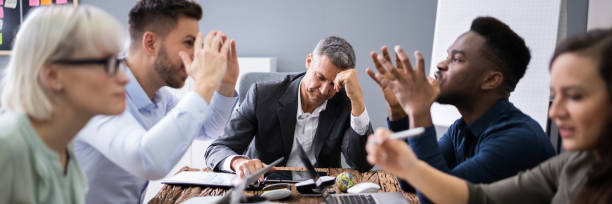 istock Business People Arguing In Meeting 1303170782