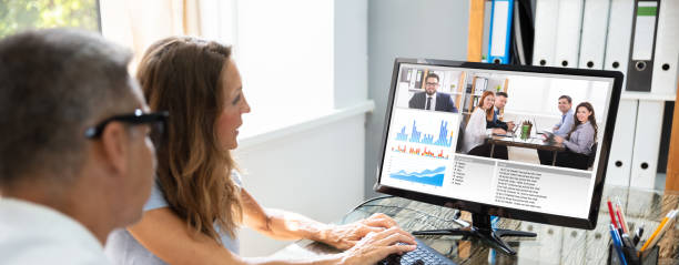 istock Businessman Video Conferencing With His Colleague 1303170791