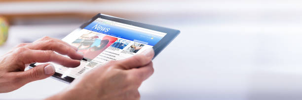 istock Close-up Of A Person's Hand Using Digital Tablet 1303170802