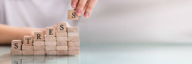 istock Person's Hand Placing Last Alphabet Of Word Stress 1303170807