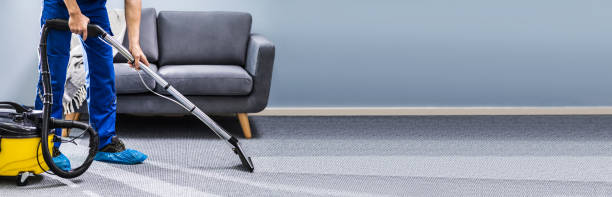 istock Person Cleaning Carpet With Vacuum Cleaner 1303172021