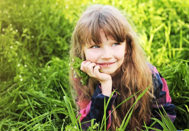 istock Little girl has fun in the park 1303174939