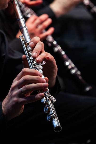 istock Hands of a musician playing the flute 1303174980
