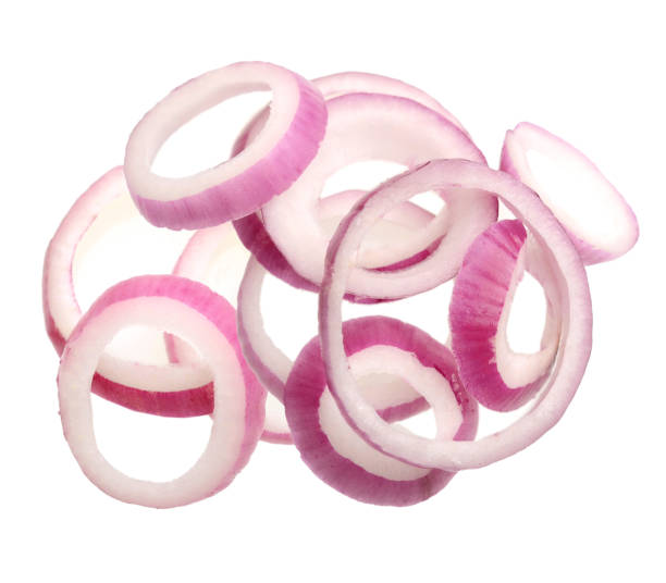 istock Sliced red onion rings on white background 1303177215