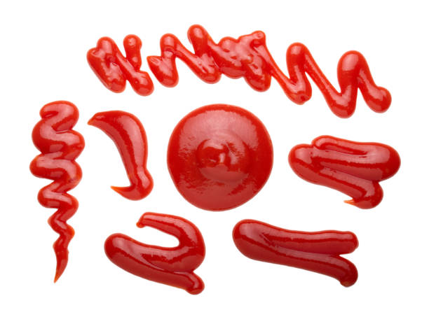 istock red tasty Ketchup or sauce isolated on white background 1303179974