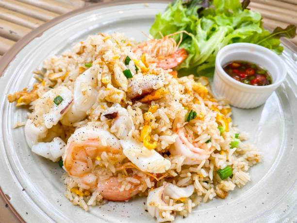 istock Thai food fried rice with shrimp on plate 1303183673