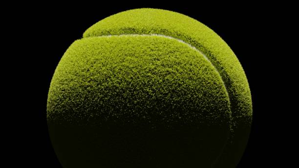 istock Tennis ball on black background. 1303187340