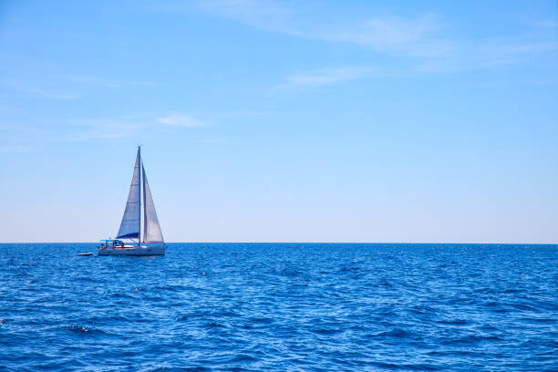 sail boat in the sea - sea water single object sailboat imagens e fotografias de stock