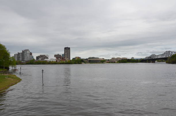 istock flooded river and buildings in Ottawa, Canada 1303192690