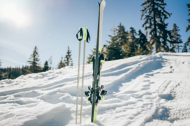 istock Ski and sticks on the snow in the mountain. 1303193888