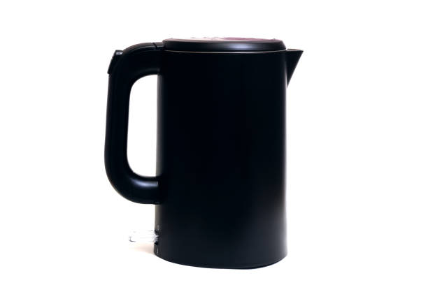 istock Black electric kettle isolated on white background 1303194534