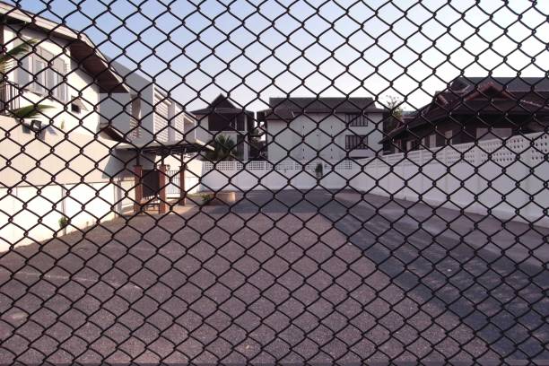 istock A fence surrounding a house 1303197145