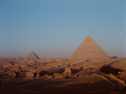 Scenic view of Giza pyramids at sunset. Medium format camera