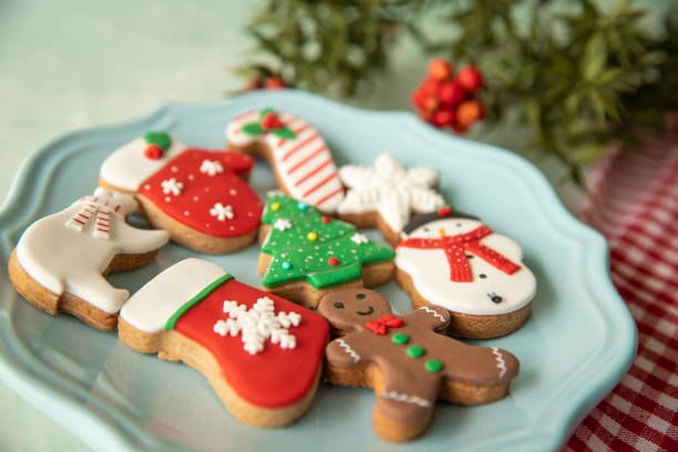 istock Fun and shaped Christmas cookies in blue plate 1303200886