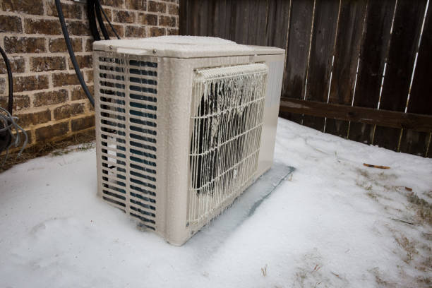 istock Mini split air conditioning outdoor unit covered in ice from winter storm 1303201753