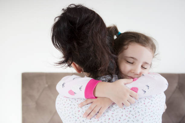 istock Mother and daughter at home 1303203747