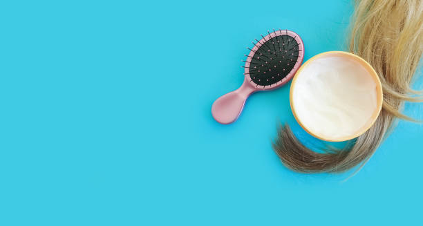 istock cosmetic mask for hair, comb 1303204123