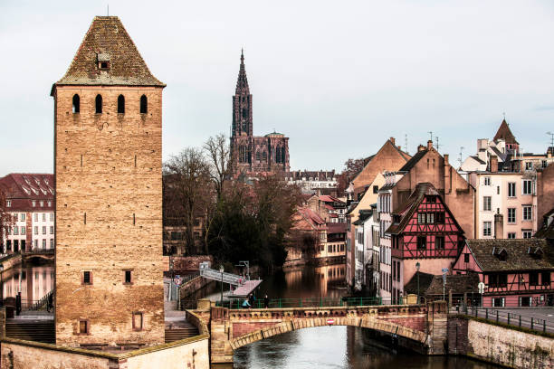 istock Buildings in Strasbourg and A Bridge With a River 1303205430