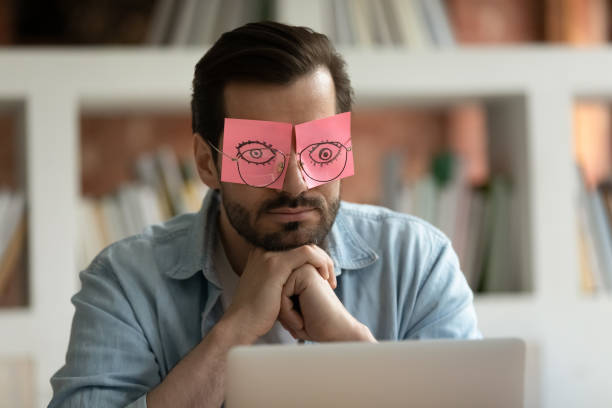 istock Tired male employee feel overwhelmed at workplace 1303206549