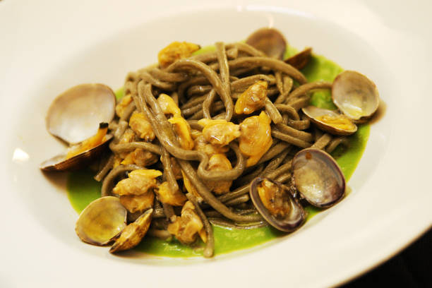 Dish on the table with ciriole, mushrooms and truffle