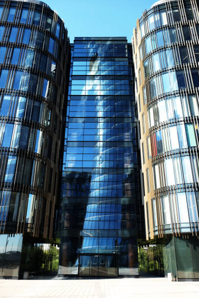 istock modern business center with big glass wnindows 1303210024