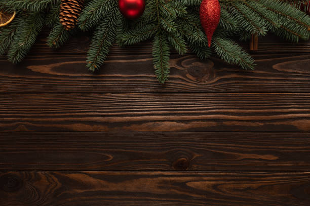 istock Wooden background decorated with New Year's decor with space for text 1303212512