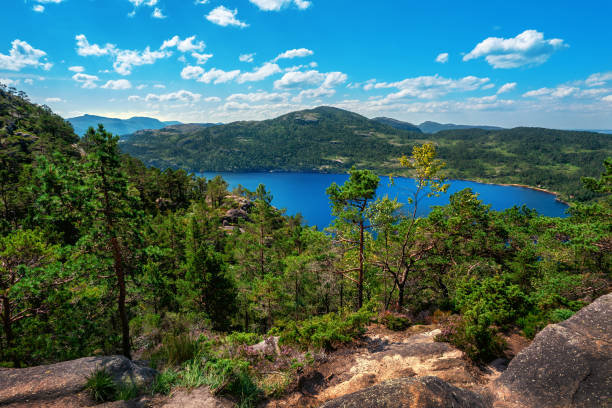 istock Lake on the footpath to Preikestolen cliff 1303213703