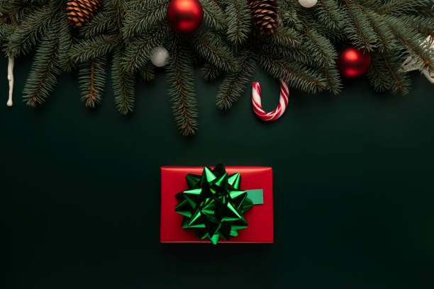 istock A box with a Christmas present lies on the table 1303214759