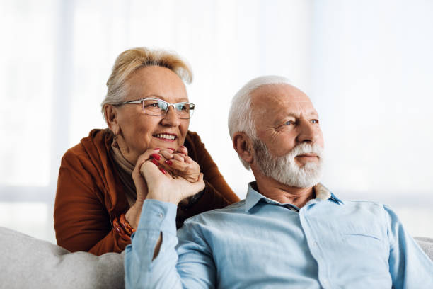 istock Loving  senior couple spending their time at home 1303216992