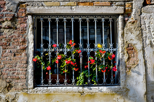 Old Venetian window. Detail of a facade in Venize, Italy