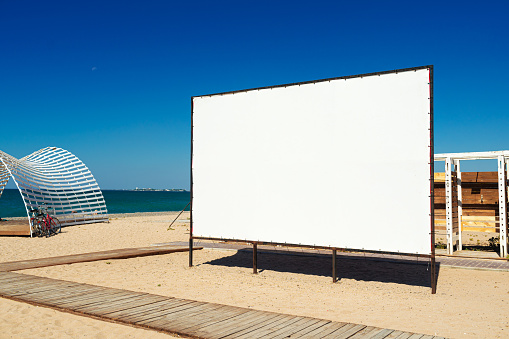 Empty big blank billboard on the beach close up
