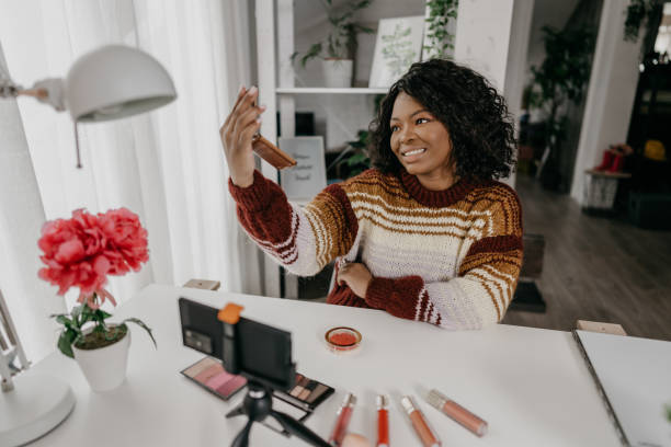 istock Influencer recommending product online 1303222895