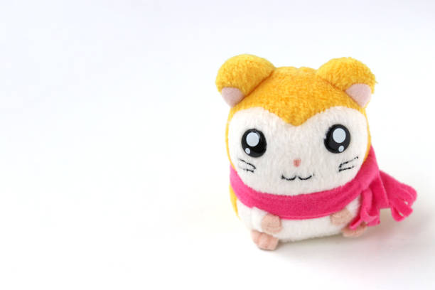 istock Children's soft toy mouse in a pink scarf is located on a white background 1303223577