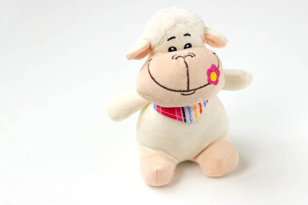 istock Soft funny toy sheep isolated on white background 1303223690