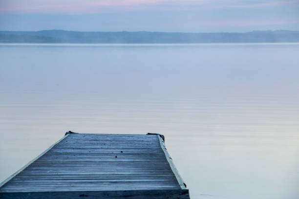 istock Sunrise Northern Lake Dock 1303224611