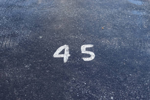 istock Numbers painted on concrete and asphalt surfaces 1303225557
