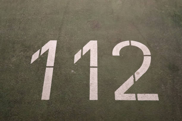 istock Numbers painted on concrete and asphalt surfaces 1303225573