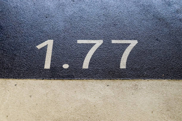 Numbers painted on concrete and asphalt surfaces